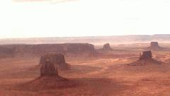 Foreground left: East Mitten; Behind it: Merrick Butte; Background from left to center: Mitchell Mesa; To the right of it the smaller Gray Whiskers; Far right foreground: West Mitten; Background: Mitchell Butte Image03.jpg
